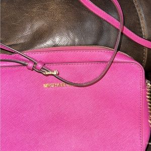 Michael Kors Fushia cross body with matching wallet